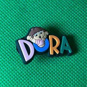 🌼 (5/$10 or 10/$15) NEW “Dora” Fun Croc Shoe Charm Collection